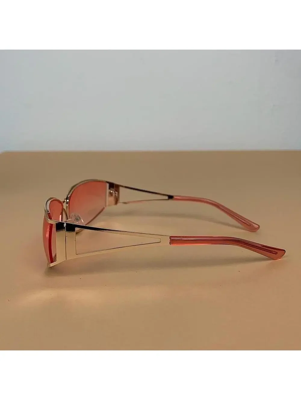 Vintage y2k 2000s classy pink chrome trim sunglasses. Chrome trim pink lenses